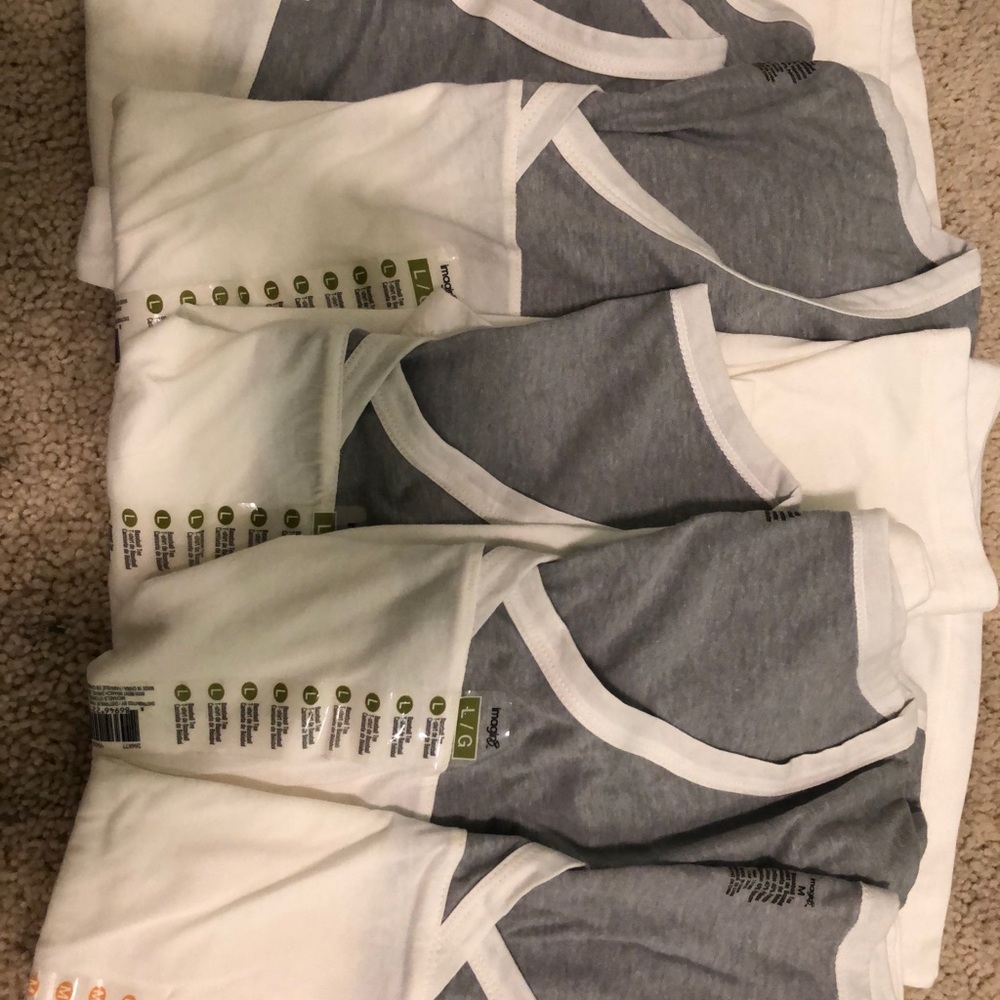 Set of 5 BRAND NEW sporty women’s t’s (1 M/4 L)